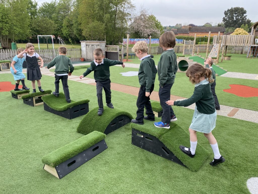 Children playing on playground equipment