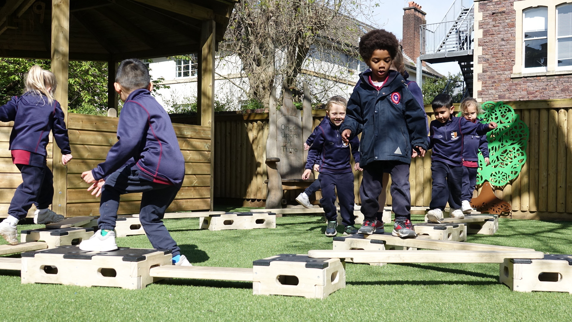 Children playing with engineering set